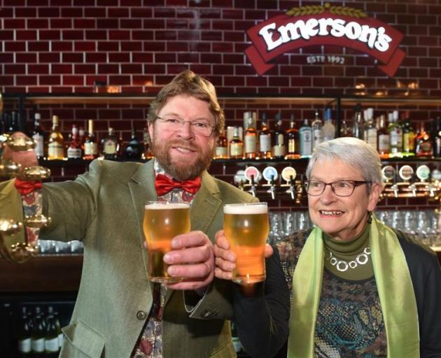 Richard Emerson and his mother, Ingrid, raise a glass at the opening yesterday. Photo: Peter McIntosh