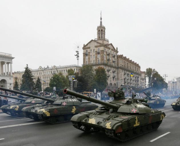 Ukrainian T-64 tanks drive during Ukraine's Independence Day military parade in central Kiev on...