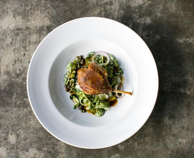 Confit duck with kohlrabi, capers and watercress.