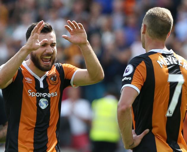 Hull City's Robert Snodgrass and David Meyler celebrate at the end of the game. Photo: Reuters