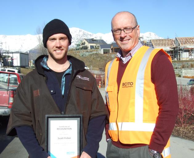 Queenstown apprentice carpenter Scott Fisher (left) and BCITO chief executive Warwick Quinn. Photo by Guy WIlliams.