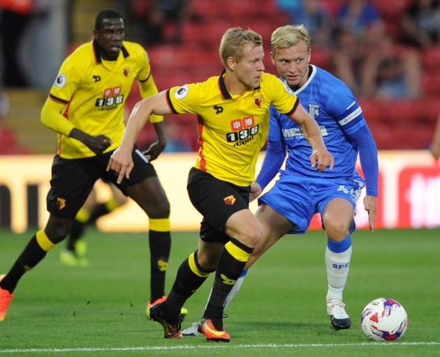 Watford's Matej Vydra in action with Gillingham's Josh Wright. Photo: Reuters