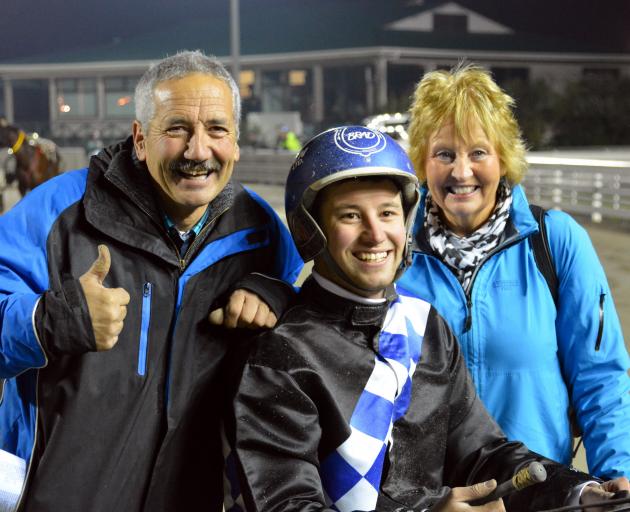 Phil Williamson (left) with youngest son Brad and wife Bev at Forbury Park in June. Photo by Matt Smith.