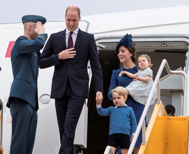 Prince William, Catherine, Duchess of Cambridge, Prince George and Princess Charlotte arrive at...
