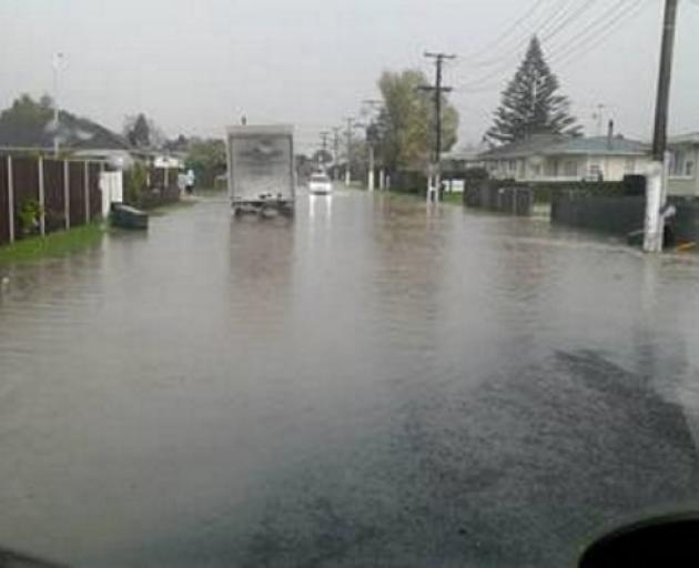 Surface flooding on Sheehan Ave in Papakura. Photo: NZ Herald