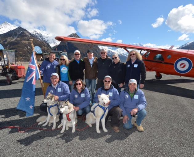 Supporters and tractor drivers are (back from left) Nigel Watson (holding flag), Michele Ayres,...