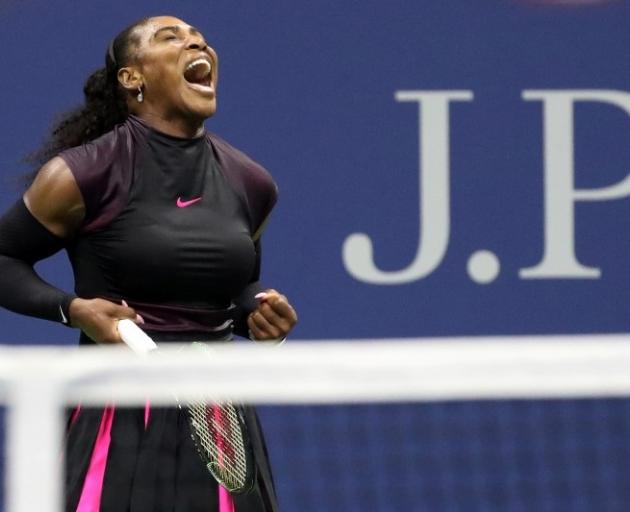 Serena Williams of the United States reacts against Simona Halep of Romania (not pictured) on day...