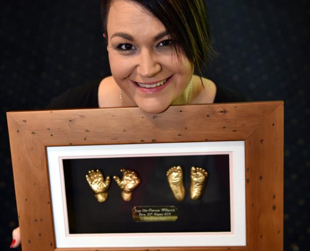A Star is Born chairwoman Julie Moyle displays a 3-D hands and feet casting at the launch of the...