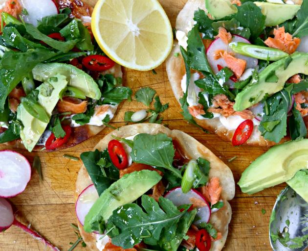 Tostadas with salmon, radish and avocado.