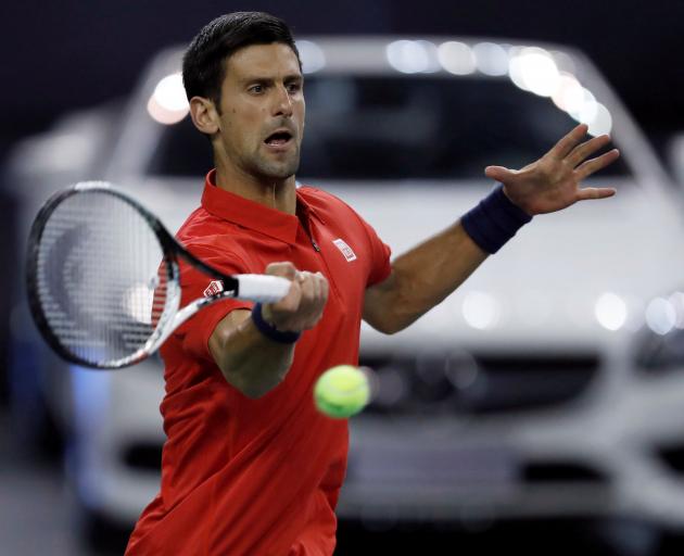 Novak Djokovic plays a shot in his match against Fabio Fognini. Photo: Reuters