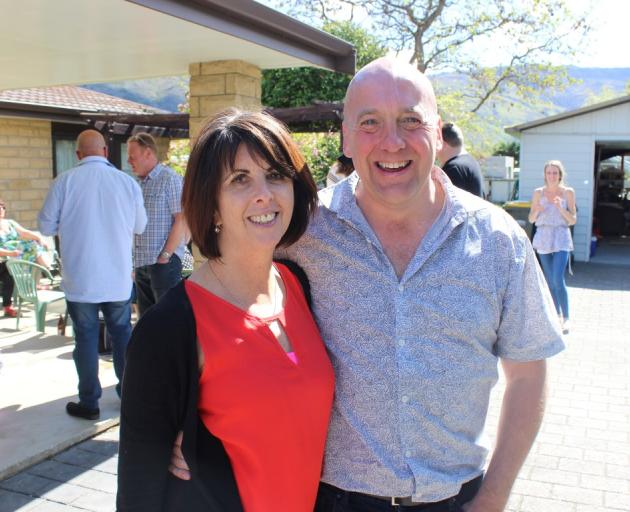 Newly-elected Central Otago mayor Tim Cadogan and wife Linda celebrate the win with friends and...