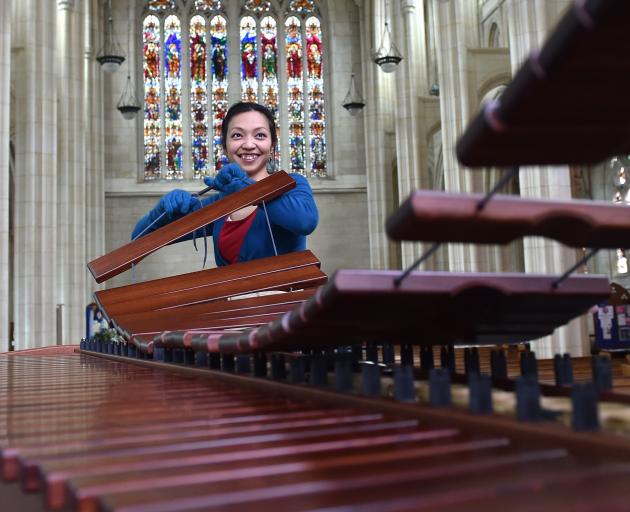 Musician Yoshiko Tsurutu sets up her marimba at St Paul's Cathedral yesterday for her Arts...