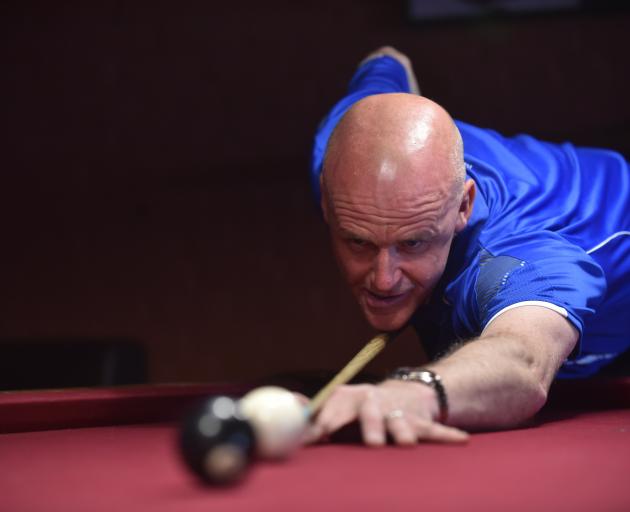 New Zealand’s No1-ranked snooker player Neil Whalley playing at the South Island 10-ball pool...
