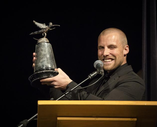 Jossi Wells with the trophy for overall athlete of the year at the New Zealand snowsports awards...