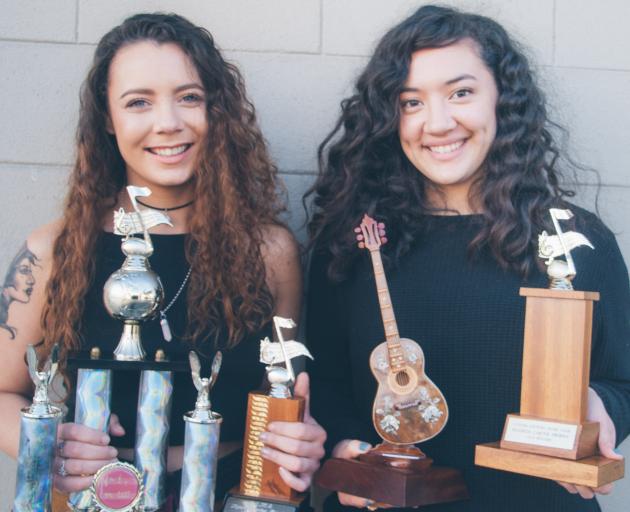 Musical duo Just Us, Teisha Seymour (left) and Karina Murray-Dodd, won the senior overall award in the Balclutha Country Music Club's talent quest at the weekend. Photo by Cyndilu Miller.