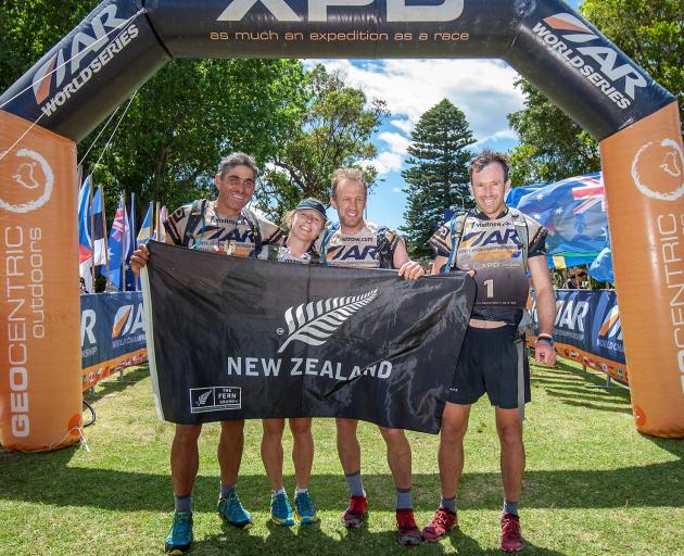 Tired but triumphant Team Seagate (from left) captain Nathan Fa'-avae, Jo Williams, Stu Lynch and Chris Forne crossed the finish line as the winner of the 2016 Adventure Racing World Championships in Australia yesterday. Photo by Jim Zirn.