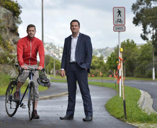 Spokes Dunedin chairman Dr Robert Thompson (left) and Dunedin City Council acting transport group manager Richard Saunders on the newly finished section of cycleway on Portobello Rd. Photo by Gerard O'Brien.