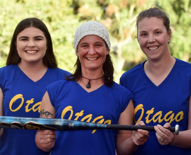 Otago softball players (from left) Shayla Rowley, Jackie Padman and Kirsty Currie at the Kaikorai Rugby Club grounds last night. Photo by Peter McIntosh.