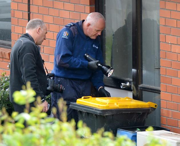 Police at the scene of the weapons theft. Photo ODT files