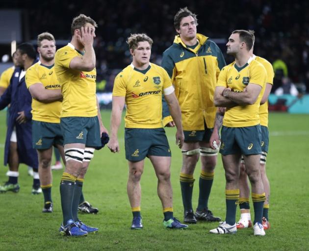 Australia players after losing to England. Photo: Reuters