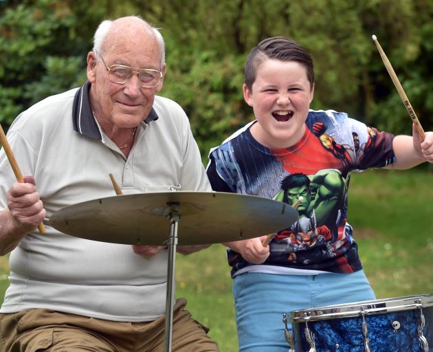 Ray Harwood (left) donates his Premier drum kit to young drumming enthusiast Jamie Hall. Photo by Peter McIntosh.