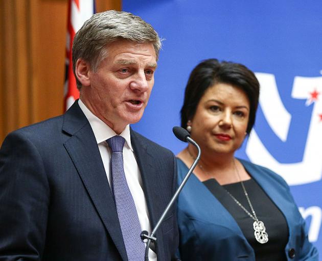 Bill English and Paula Bennett speak to media during a press conference at Parliament before...