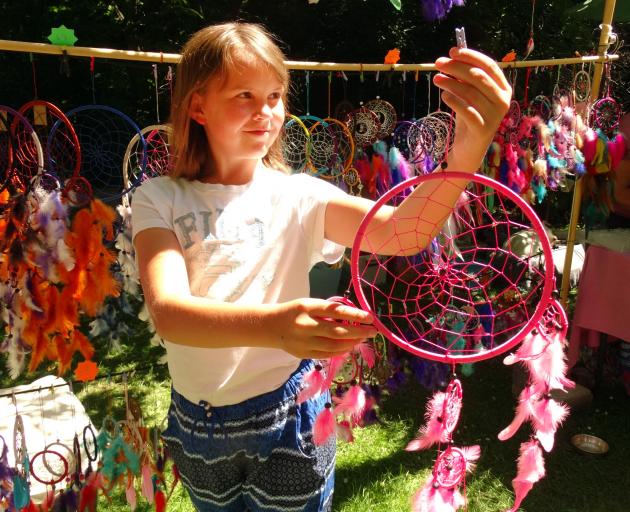 Maggie Watts (10) eyes up a dream catcher. Photo by Louise Scott.