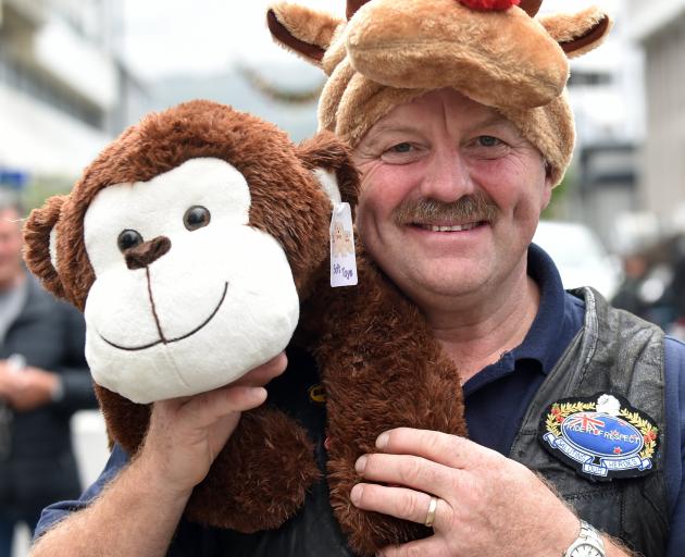 Bronz Otago Motorcycle Club president Phil Scorringe with a cuddly bear given to the Toy Run in...