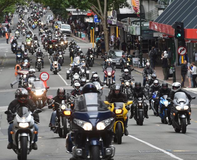 About 300 motorcycles travel along George St for the 33rd annual Bronz Toy Run.