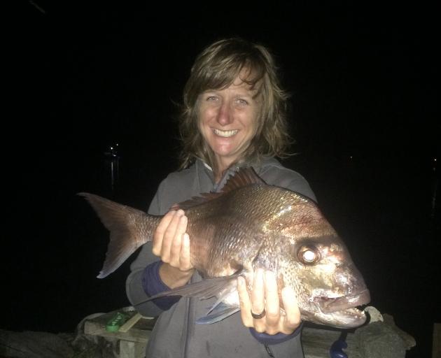 Liz Breslin with the best snapper caught that night. Photo: Brad Carden