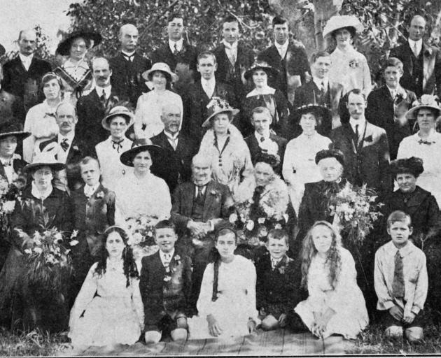The gathering at the Diamond Wedding celebration on November 25, 1916 of Mr and Mrs Henry...
