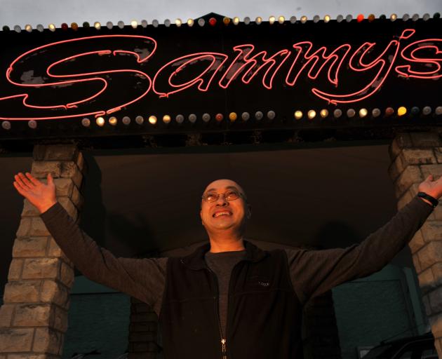 Sam Chin outside Sammy's when it reopened in mid-2011. Photo by Gerard O'Brien.