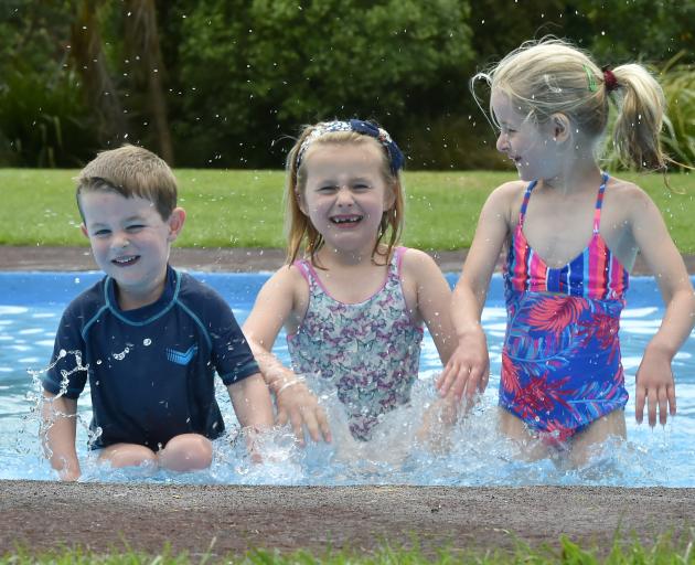 Making the most of a brief spell of warm weather, friends William Hepburn (3), Indy Matchett (6)...