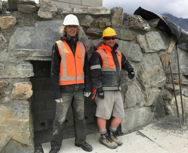 Artist Dan Kelly (left) and John Golden take a break from work on Camp Glenorchy’s Scheelite...