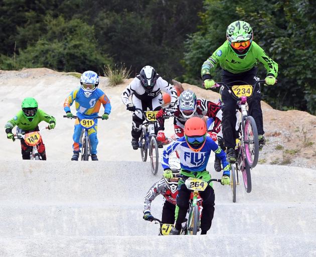 Lachie James, of Alexandra, leads the pack in the 12-13 boys race on the Dunedin BMX club's new...