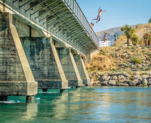 Jumping into the Clutha River. Photo: Si Williams