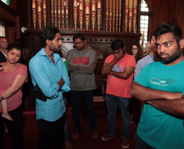 Indian students at the Unitarian Church in Ponsonby may now be able to reapply for student visas...