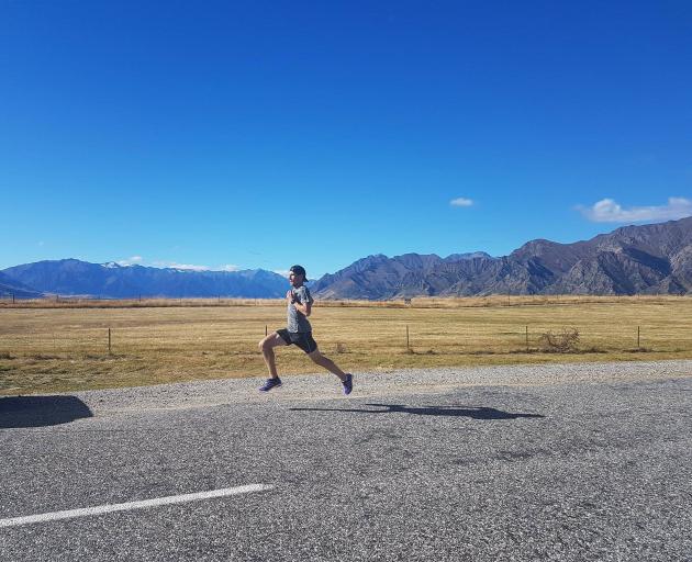 Olympian Nick Willis pushes himself while training near Lake Hawea last week. The two-time Olympic medallist is spending about a month in the Upper Clutha as part of a training camp before he heads back to the northern hemisphere to compete. Photo supplie