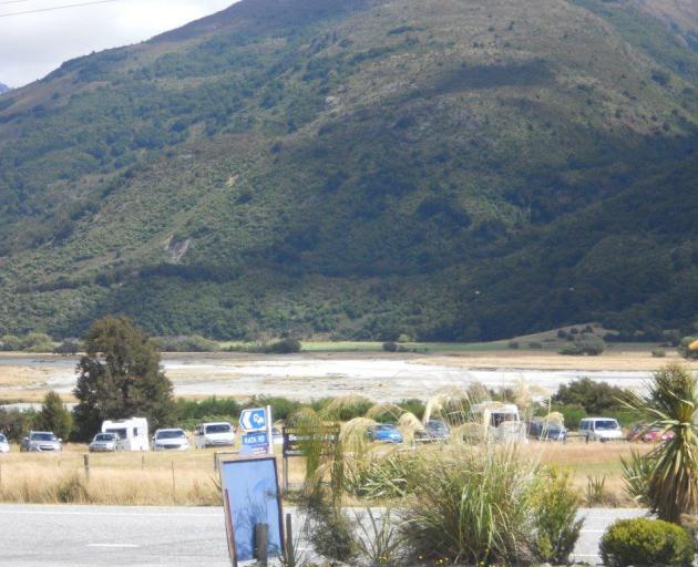 The number of vehicles seen yesterday in a car park used by trampers indicate people may be in Mt Aspiring National Park today as pest control work starts. Photo supplied.