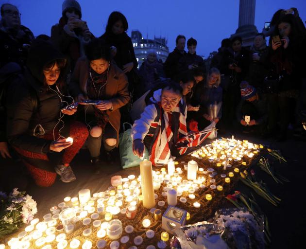 People remember those killed in Khalid Masood's attack. Photo: Reuters