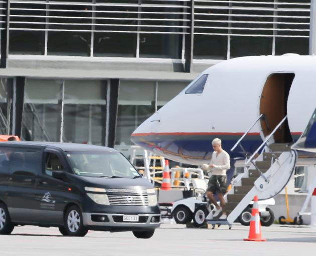 Justin Bieber arrives at Queenstown airport by private jet yesterday. Photo: Blair Pattinson