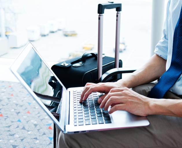 Several airlines are banning laptops and technology in carry-on luggage. Photo: Getty