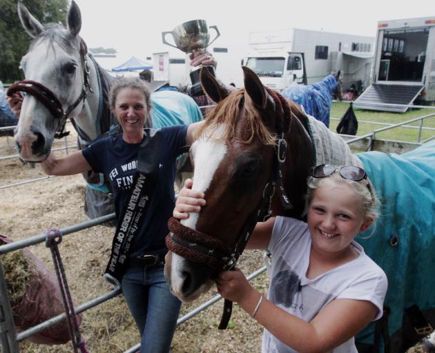 Abby Hore (left), of Beaumont Station, relaxes with her daughter Jess Hore after winning the amateur rider of the year title at the Horse of the Year show in Hastings. Photo by Paul Taylor/Hawkes Bay Today.