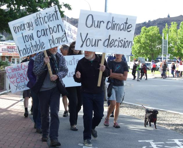 Leading the way in a climate change march in Alexandra in November 2015 are Brian Turner, of...