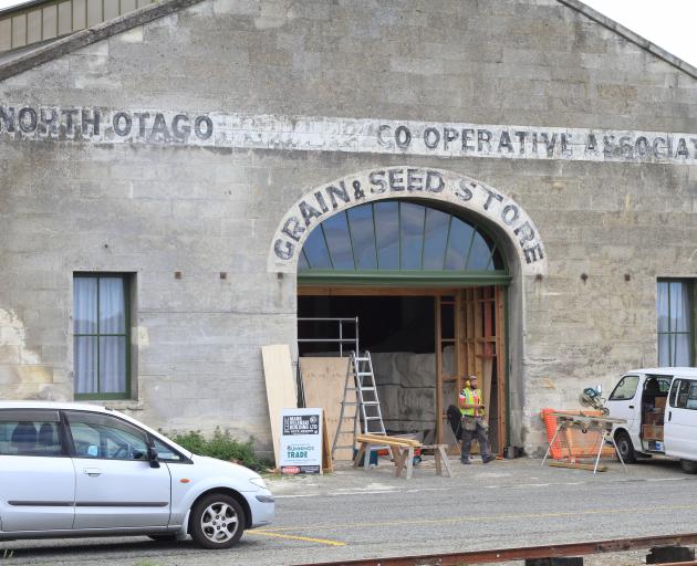 Work crews put the finishing touches on Tourism Waitaki's ''Harbour St Project'' yesterday. An opening date has yet to be announced. Photo by Hamish MacLean.