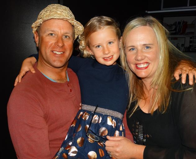 Young actress Georgia Spillane, centre, pictured with dad Mitch and mum Josie at The Inland Road premiere on Friday night. Photo by Louise Scott.