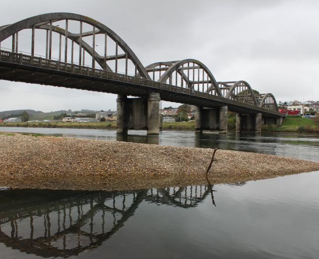 There is concern a build-up of gravel in the Clutha River underneath the Balclutha Bridge may increase the possibility of flooding. Photo: Samuel White