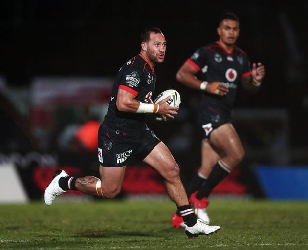 Bodene Thompson carries the ball for the Warriors against the Storm earlier this year. Photo:...