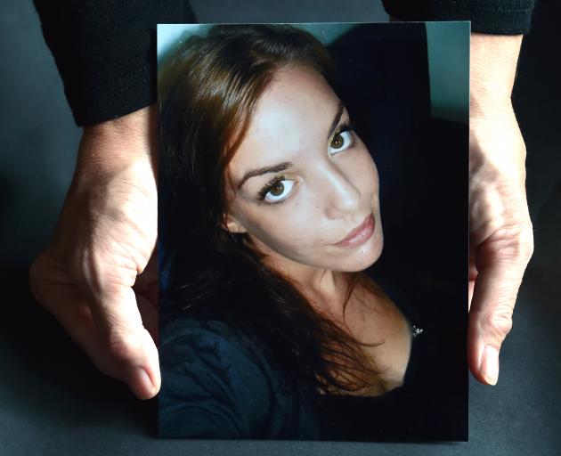 Brenda Ward holds a photo of her daughter Erica, who was killed in a car crash south of Dunedin last Friday. Photo by Peter McIntosh.