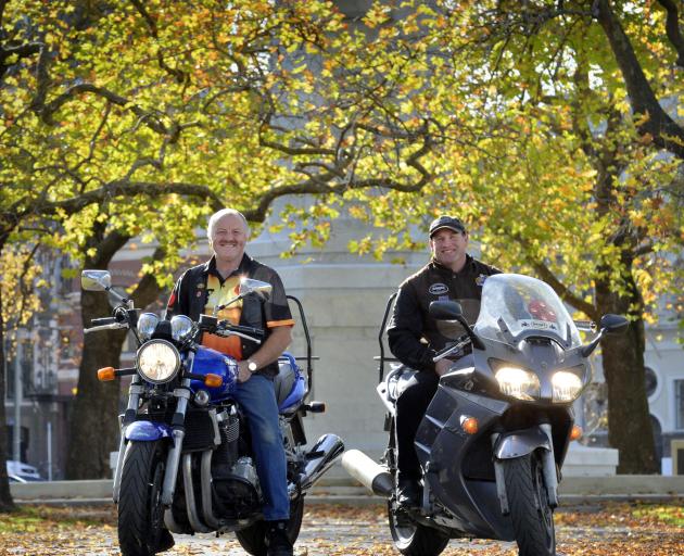 Ride of Respect participants Phil Scorringe (left) and AJ Todd at Queens Garden in Dunedin yesterday. Photo by Gerard O'Brien.